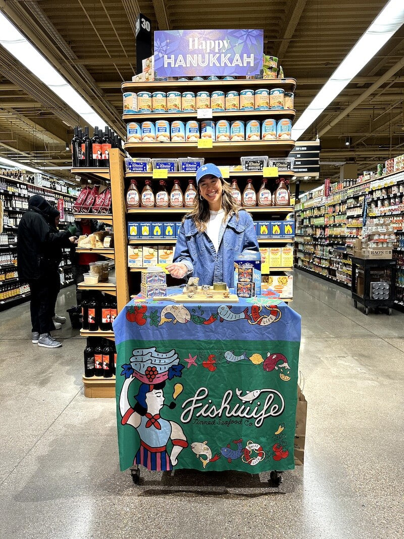 Fishwife presentation in a grocery store.